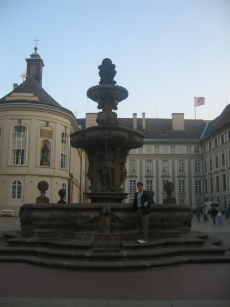 Rob standing next to the outer courtyard's fountain