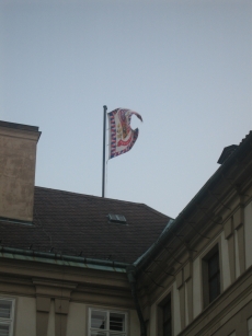 A flag flies over the outer courtyard