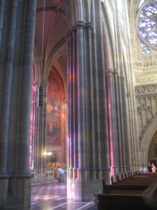 Colored light splashing across several pillars