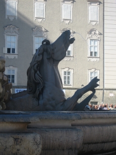 One of the horse statues at the base of the fountain