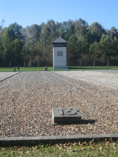 Where barrack #16 used to stand, along with western guard tower at Dachau